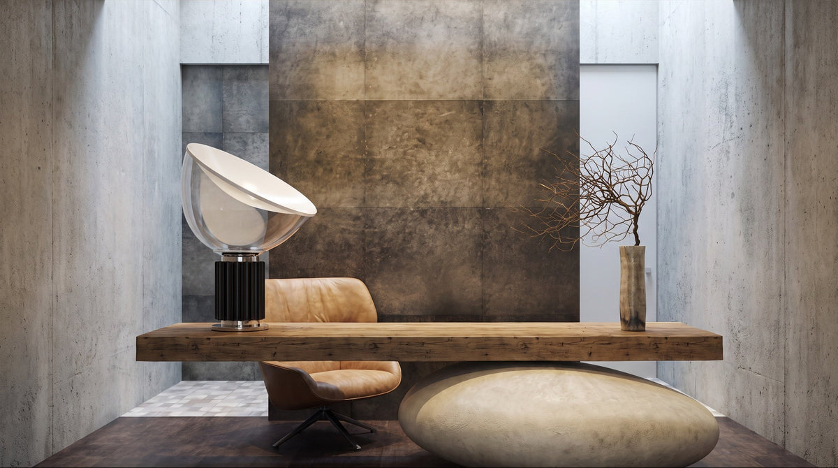 Zenith glass and metal table lamp on a wood slab desk on a boulder in concrete room