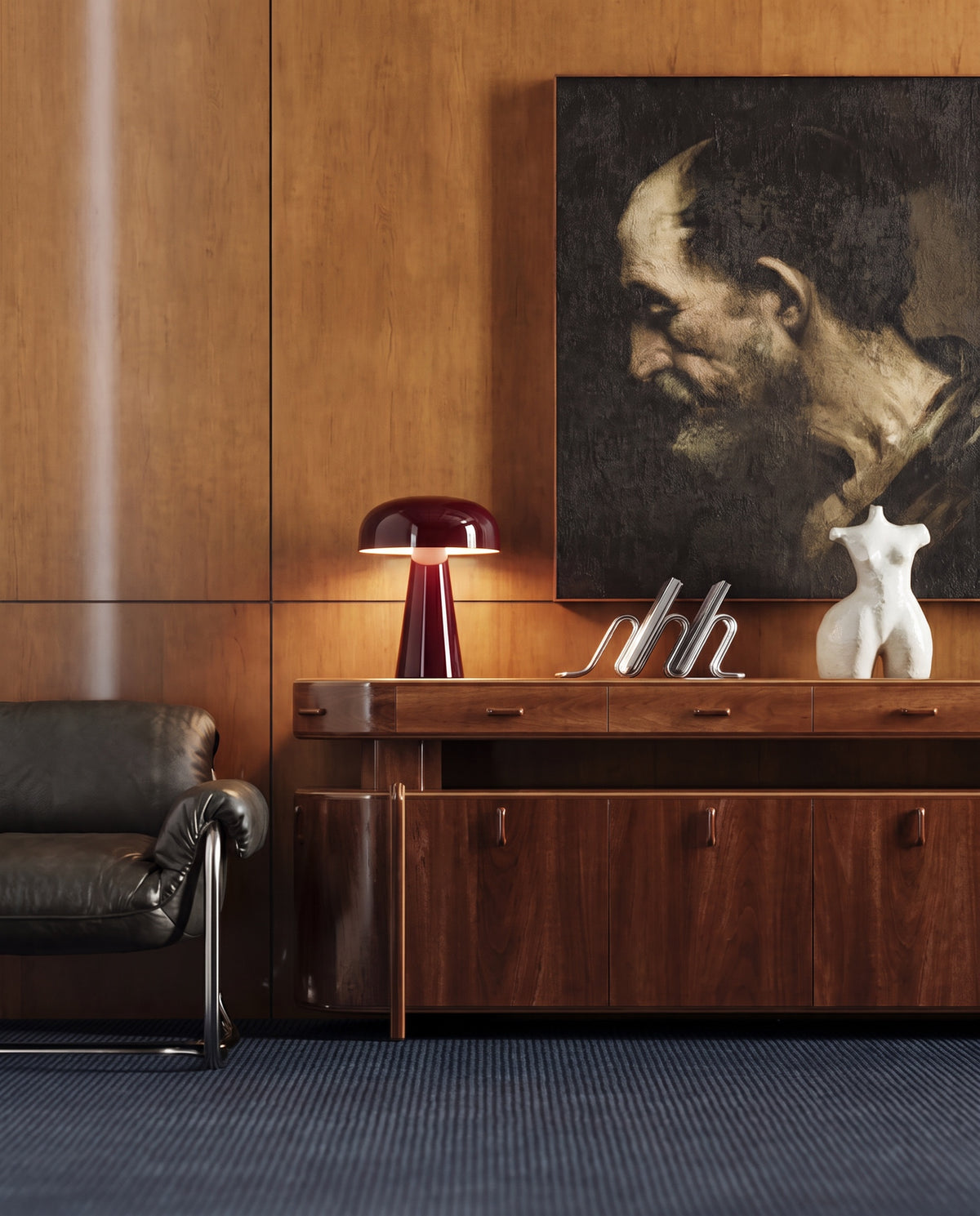 Rubra lacquered table lamp, lit, on walnut credenza under a portrait painting, wood-paneled room
